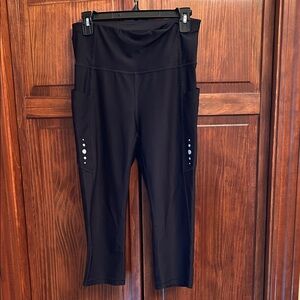 Elegant Black Capris with Button Accents